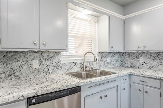 27 NE 65th St, Oklahoma City, OK 73105 - kitchen featuring dishwasher, light countertops, and backsplash