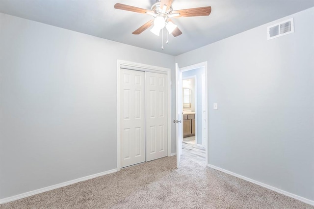 27 NE 65th St, Oklahoma City, OK 73105 - unfurnished bedroom with light carpet, a closet, and ceiling fan