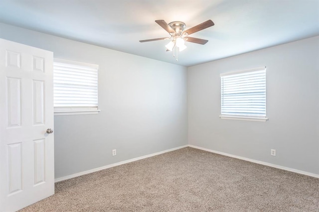 27 NE 65th St, Oklahoma City, OK 73105 - empty room featuring carpet floors and a ceiling fan