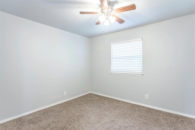 27 NE 65th St, Oklahoma City, OK 73105 - carpeted spare room featuring ceiling fan and baseboards