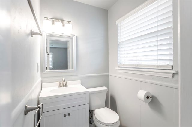 27 NE 65th St, Oklahoma City, OK 73105 - half bath featuring toilet and vanity