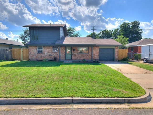 111 S Bristow Ave, Moore, OK 73160 - view of front of home featuring concrete driveway, brick siding, and a garage