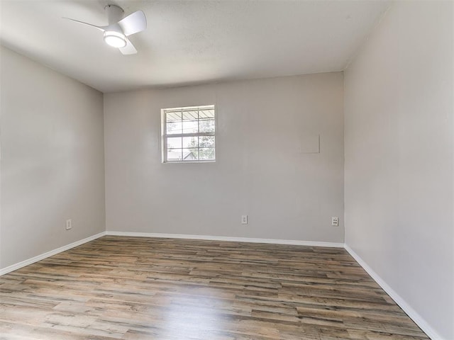 111 S Bristow Ave, Moore, OK 73160 - empty room with wood finished floors and a ceiling fan
