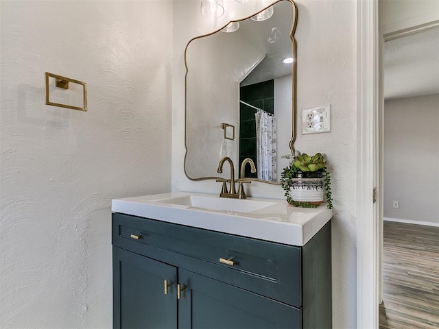 111 S Bristow Ave, Moore, OK 73160 - full bath featuring vanity and wood finished floors