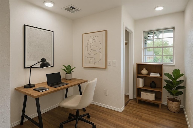 111 S Bristow Ave, Moore, OK 73160 - home office featuring wood finished floors and baseboards