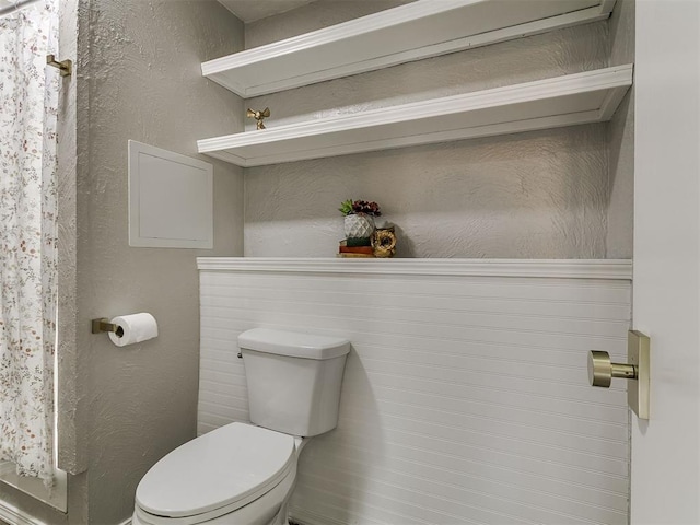 111 S Bristow Ave, Moore, OK 73160 - bathroom with toilet and a textured wall