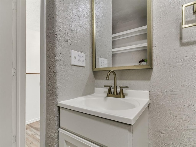 111 S Bristow Ave, Moore, OK 73160 - bathroom featuring vanity and wood finished floors