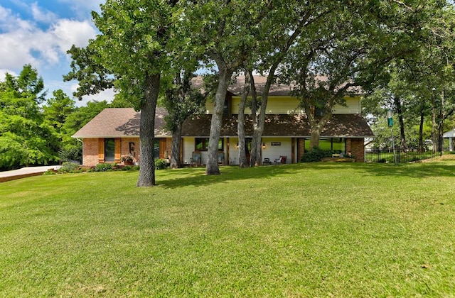 12629 Teakwood Rd, Oklahoma City, OK 73013 - view of front of property with brick siding and an attached garage