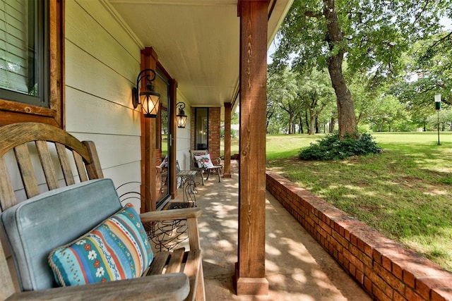 12629 Teakwood Rd, Oklahoma City, OK 73013 - porch with a lawn and view of wooded area
