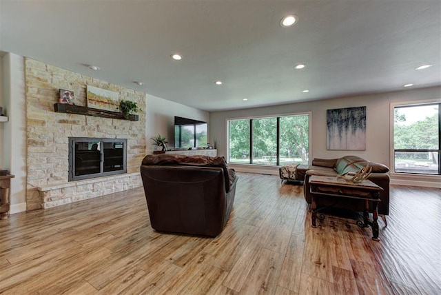 12629 Teakwood Rd, Oklahoma City, OK 73013 - living room with light wood-type flooring, recessed lighting, and a fireplace
