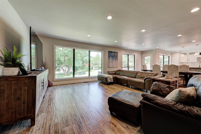 12629 Teakwood Rd, Oklahoma City, OK 73013 - living room with wood finished floors and recessed lighting