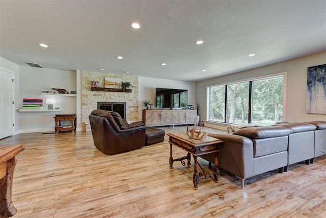 12629 Teakwood Rd, Oklahoma City, OK 73013 - living area with light wood finished floors, recessed lighting, and a stone fireplace