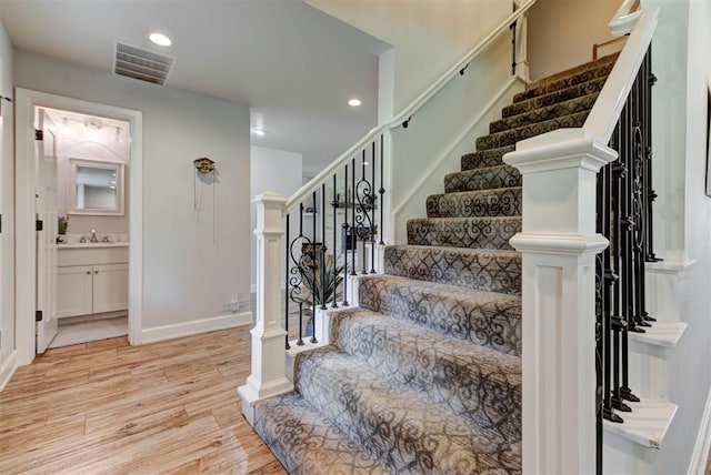 12629 Teakwood Rd, Oklahoma City, OK 73013 - staircase featuring wood finished floors and recessed lighting