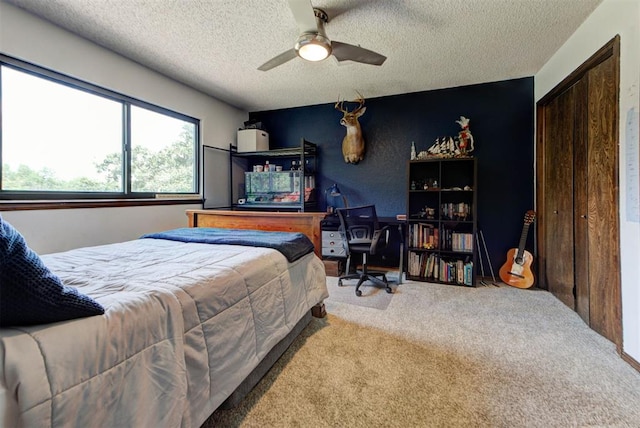 12629 Teakwood Rd, Oklahoma City, OK 73013 - carpeted bedroom featuring a textured ceiling and a ceiling fan