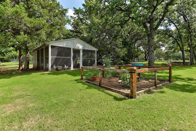 12629 Teakwood Rd, Oklahoma City, OK 73013 - view of green lawn featuring a vegetable garden and a sunroom