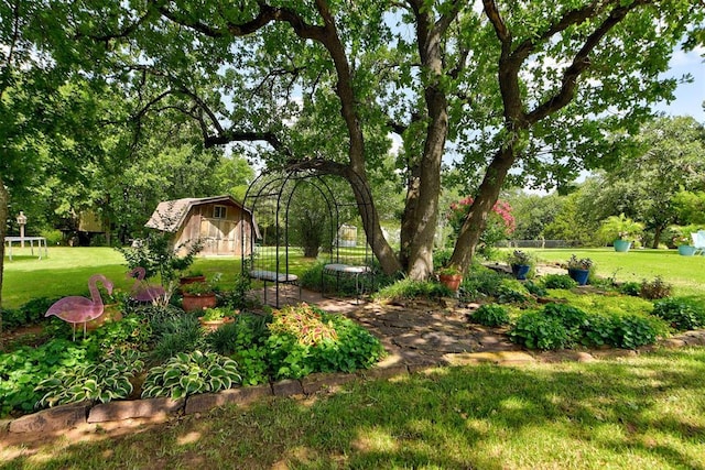 12629 Teakwood Rd, Oklahoma City, OK 73013 - view of green lawn featuring view of scattered trees and a shed