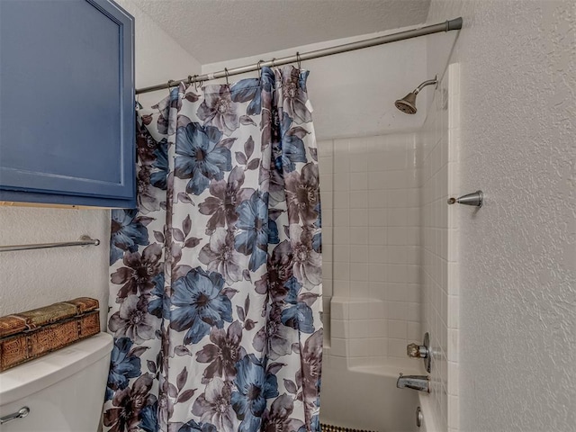 629 NW 121st St, Oklahoma City, OK 73114 - full bathroom featuring a textured wall, shower / bath combo with shower curtain, and a textured ceiling