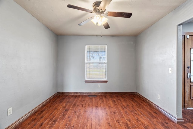 10516 NW 16th St, Yukon, OK 73099 - unfurnished room featuring hardwood / wood-style floors and a ceiling fan