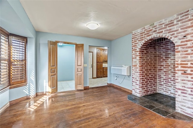 10516 NW 16th St, Yukon, OK 73099 - empty room featuring wood finished floors and a wall unit AC