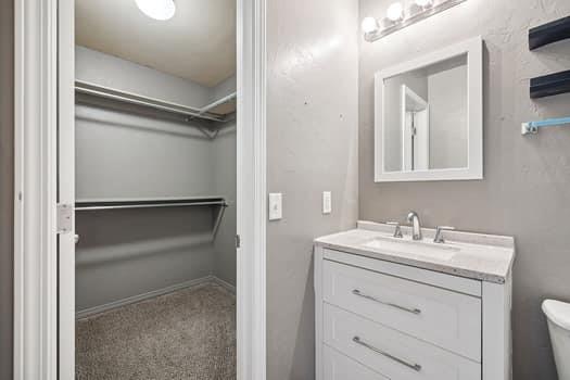2709 NW 184th St, Edmond, OK 73012 - bathroom with vanity and toilet