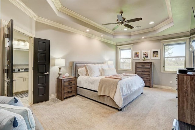 3937 NW 167th Ter, Edmond, OK 73012 - bedroom with a raised ceiling, light carpet, crown molding, ensuite bathroom, and a ceiling fan