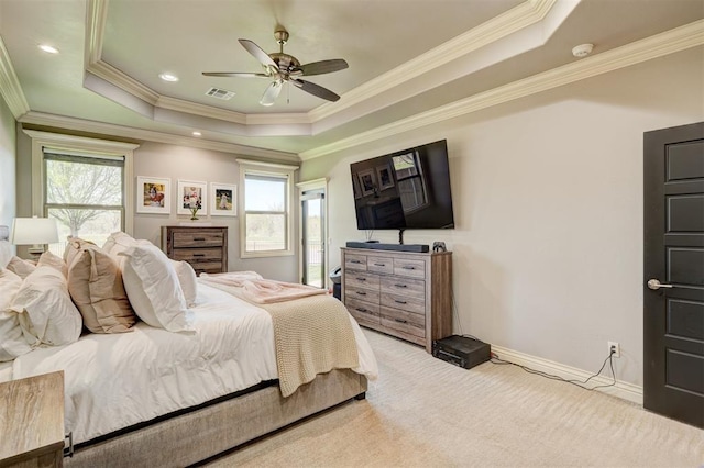 3937 NW 167th Ter, Edmond, OK 73012 - carpeted bedroom featuring a raised ceiling, crown molding, and ceiling fan