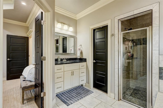 3937 NW 167th Ter, Edmond, OK 73012 - bathroom with a shower stall, vanity, crown molding, and tile patterned flooring