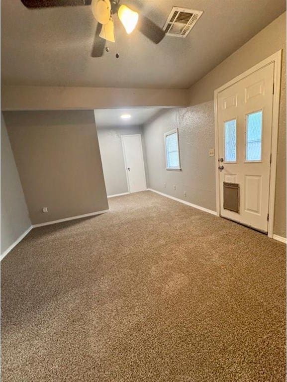 1412 NW 96th St, Oklahoma City, OK 73114 - carpeted empty room with baseboards and a ceiling fan