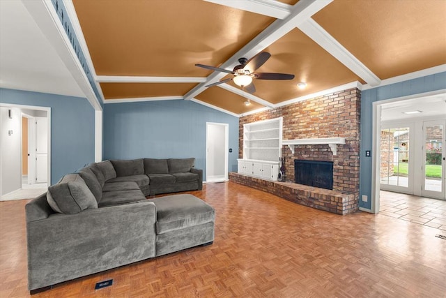 2805 Tudor Rd, Oklahoma City, OK 73127 - living room with a ceiling fan and a brick fireplace