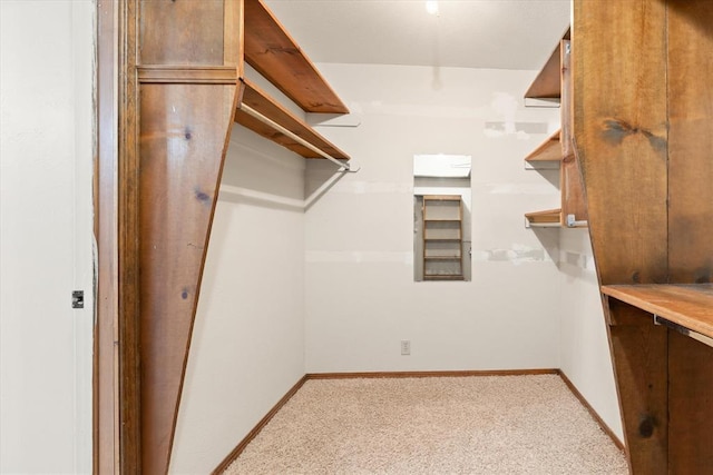 2805 Tudor Rd, Oklahoma City, OK 73127 - spacious closet featuring light carpet