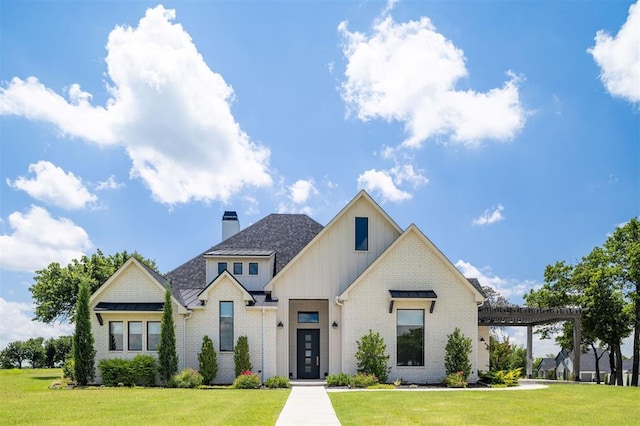 4716 Moulin Rd, Edmond, OK 73034 - modern farmhouse with a front yard, board and batten siding, brick siding, a chimney, and a pergola