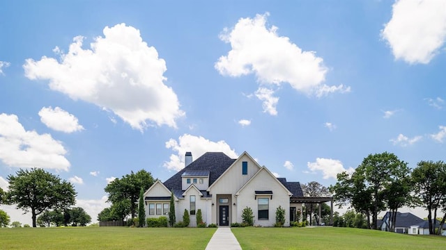 4716 Moulin Rd, Edmond, OK 73034 - view of front facade featuring a front yard and a chimney