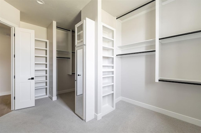 4716 Moulin Rd, Edmond, OK 73034 - spacious closet featuring carpet floors