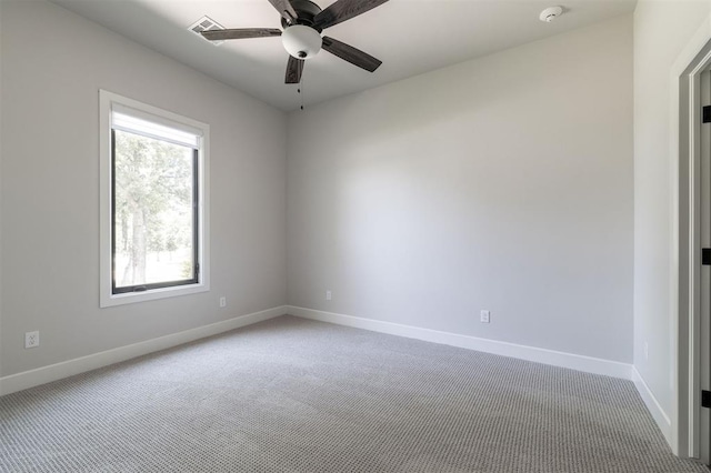 4716 Moulin Rd, Edmond, OK 73034 - unfurnished room with a smoke detector, carpet, and a ceiling fan
