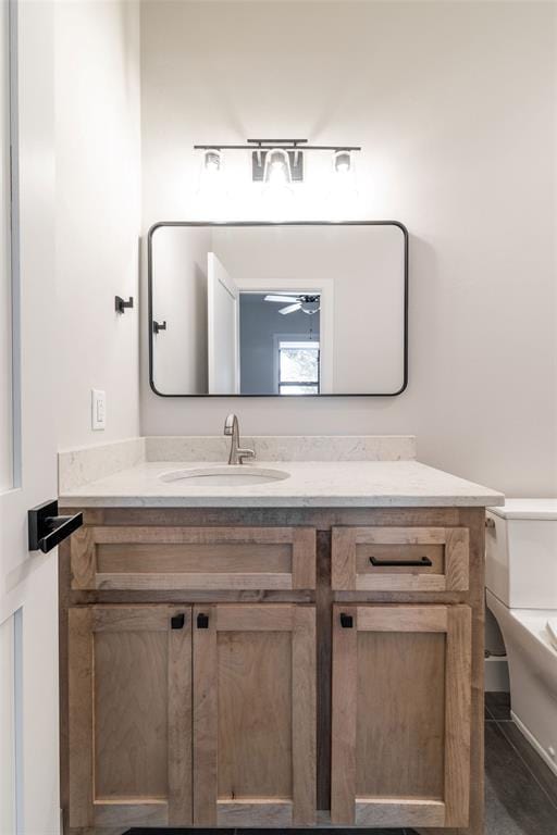 4716 Moulin Rd, Edmond, OK 73034 - bathroom featuring vanity and a ceiling fan