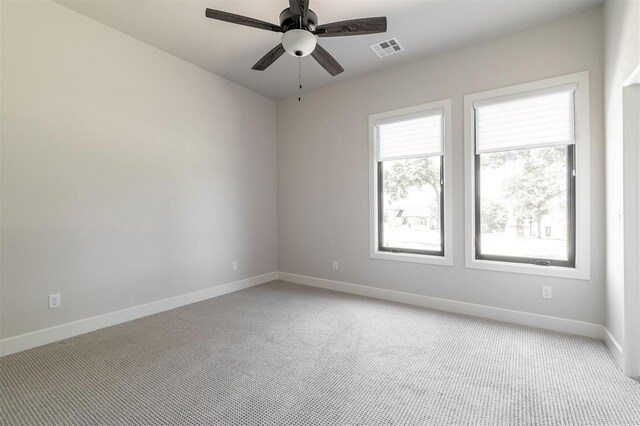 4716 Moulin Rd, Edmond, OK 73034 - spare room featuring light carpet and a ceiling fan