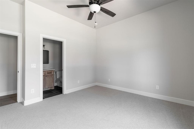 4716 Moulin Rd, Edmond, OK 73034 - unfurnished bedroom featuring carpet floors, ensuite bathroom, and ceiling fan