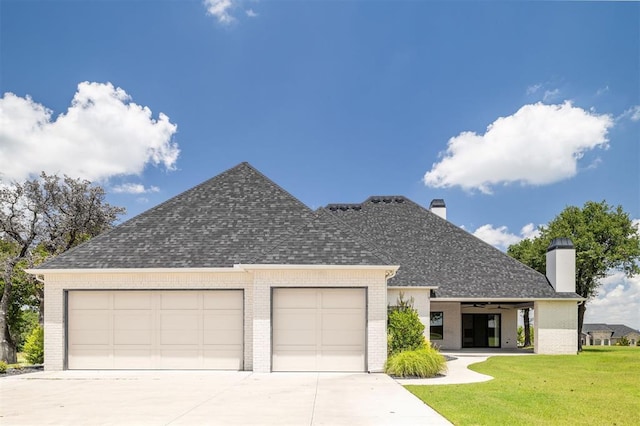 4716 Moulin Rd, Edmond, OK 73034 - view of front of property with brick siding, driveway, an attached garage, and a chimney