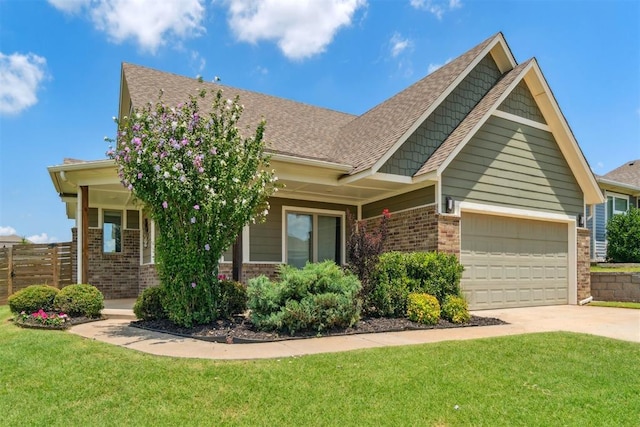 637 NW 179th Cir, Edmond, OK 73012 - craftsman-style home with brick siding, concrete driveway, a garage, and a shingled roof