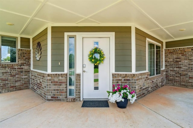 637 NW 179th Cir, Edmond, OK 73012 - view of exterior entry with brick siding