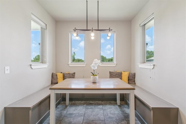 637 NW 179th Cir, Edmond, OK 73012 - dining space featuring breakfast area, healthy amount of natural light, and stone finish flooring