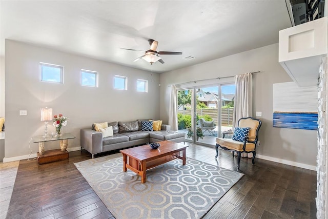 637 NW 179th Cir, Edmond, OK 73012 - living area with ceiling fan and dark wood-style floors