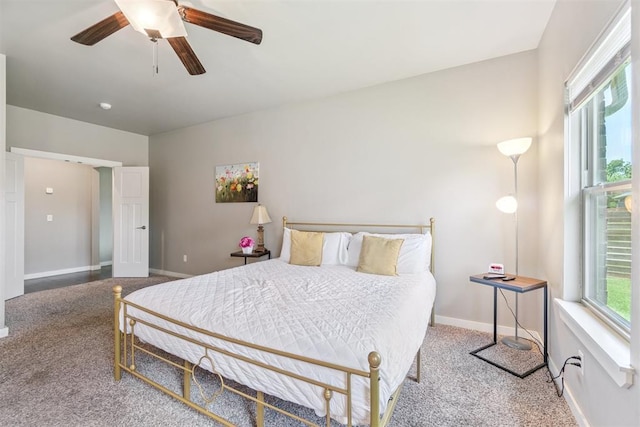 637 NW 179th Cir, Edmond, OK 73012 - carpeted bedroom featuring baseboards and ceiling fan