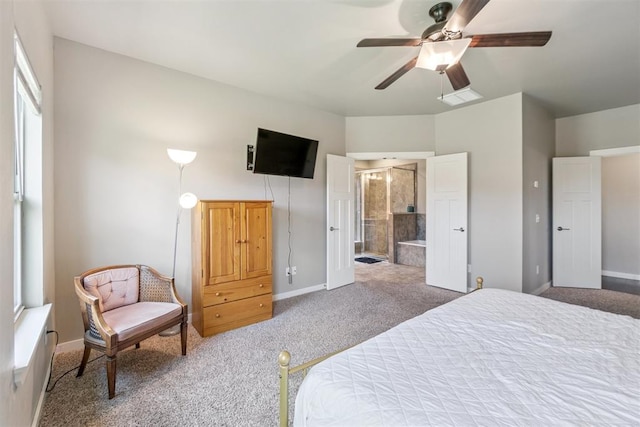 637 NW 179th Cir, Edmond, OK 73012 - carpeted bedroom featuring connected bathroom and ceiling fan