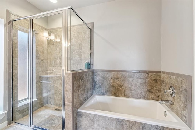 637 NW 179th Cir, Edmond, OK 73012 - bathroom with a stall shower and a garden tub