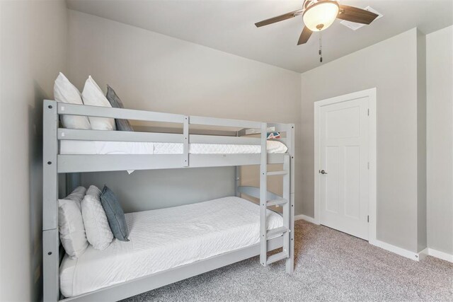 637 NW 179th Cir, Edmond, OK 73012 - bedroom with carpet floors and a ceiling fan