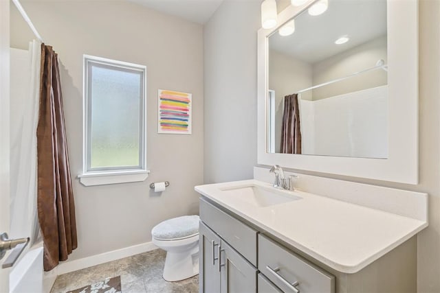 637 NW 179th Cir, Edmond, OK 73012 - bathroom with vanity and shower / bath combo with shower curtain