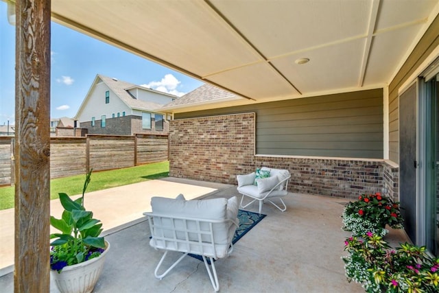 637 NW 179th Cir, Edmond, OK 73012 - fenced backyard with a patio area