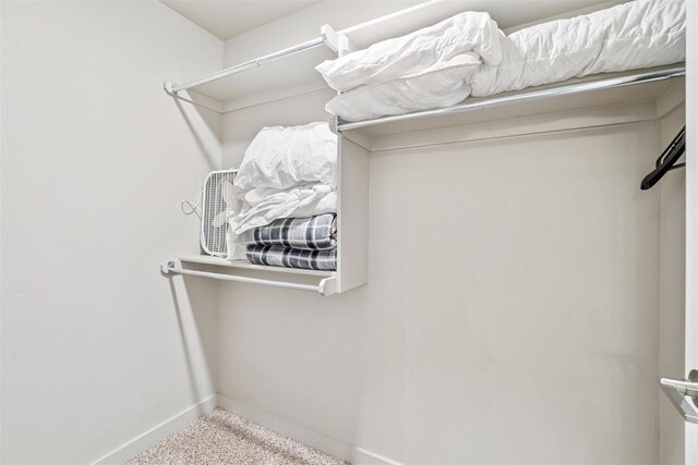 637 NW 179th Cir, Edmond, OK 73012 - spacious closet featuring carpet