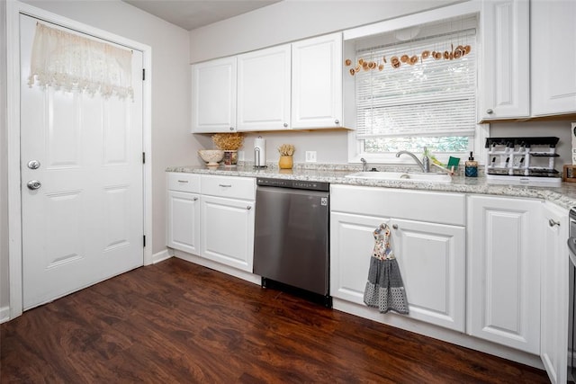 204 E Elder Ave, Duncan, OK 73533 - kitchen featuring dishwasher, dark wood-type flooring, white cabinetry, and light stone countertops